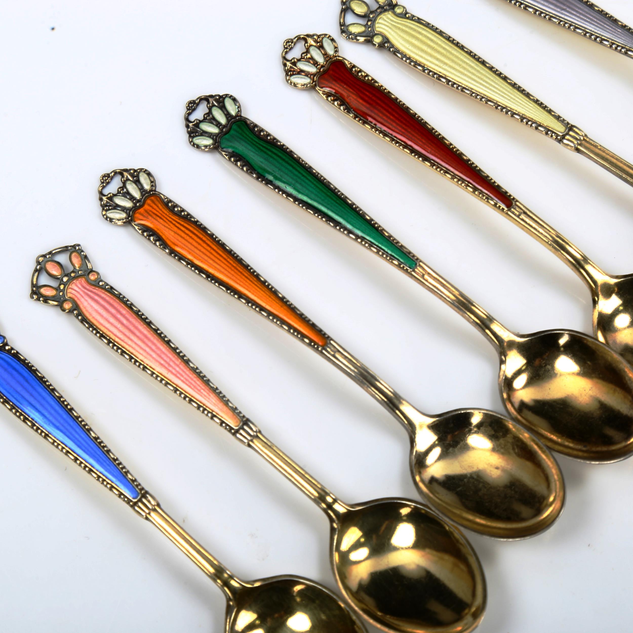 A set of 7 Norwegian vermeil sterling silver and harlequin enamel coffee spoons, length 10cm No - Image 2 of 4