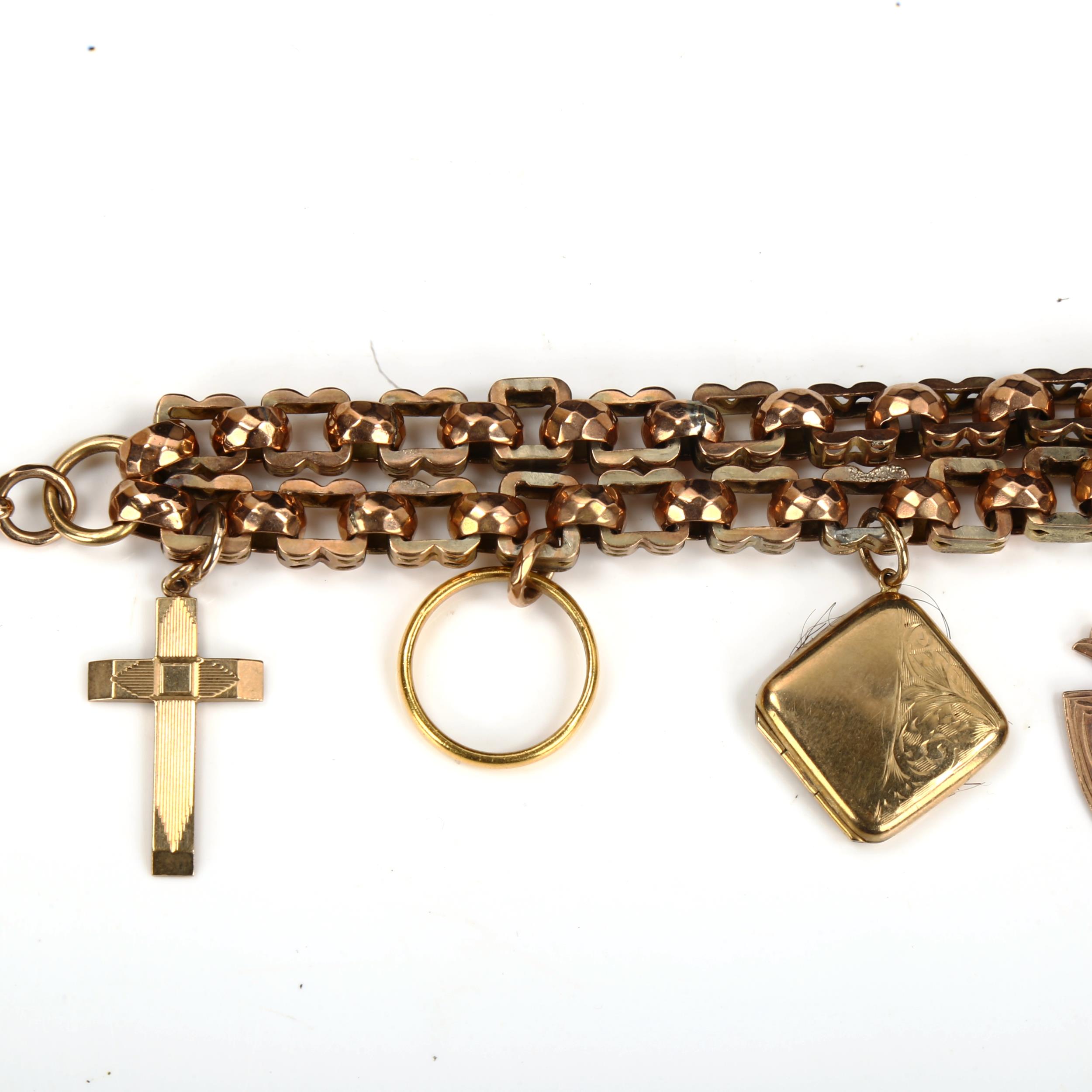 An unmarked gold double fancy link chain charm bracelet, tests as 9ct, with various charms, - Image 3 of 5