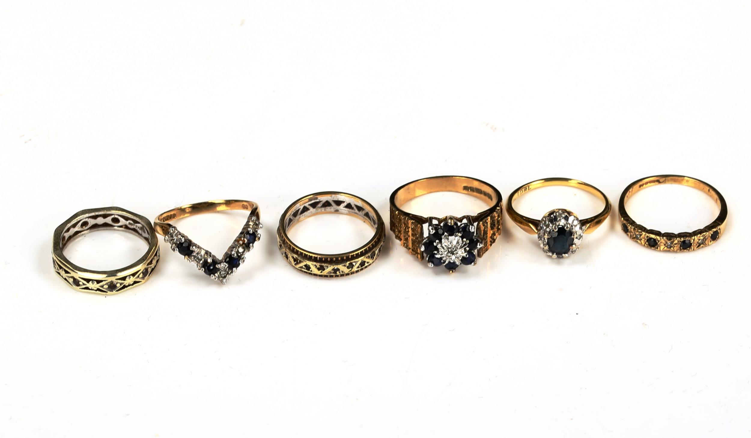 6 stone set rings, comprising 4 x 9ct (11g), 1 x 18ct (2.8g), and 1 x unmarked (3g) (6) No damage or
