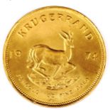 A 1974 South African 1oz fine gold Krugerrand coin, 33.95g