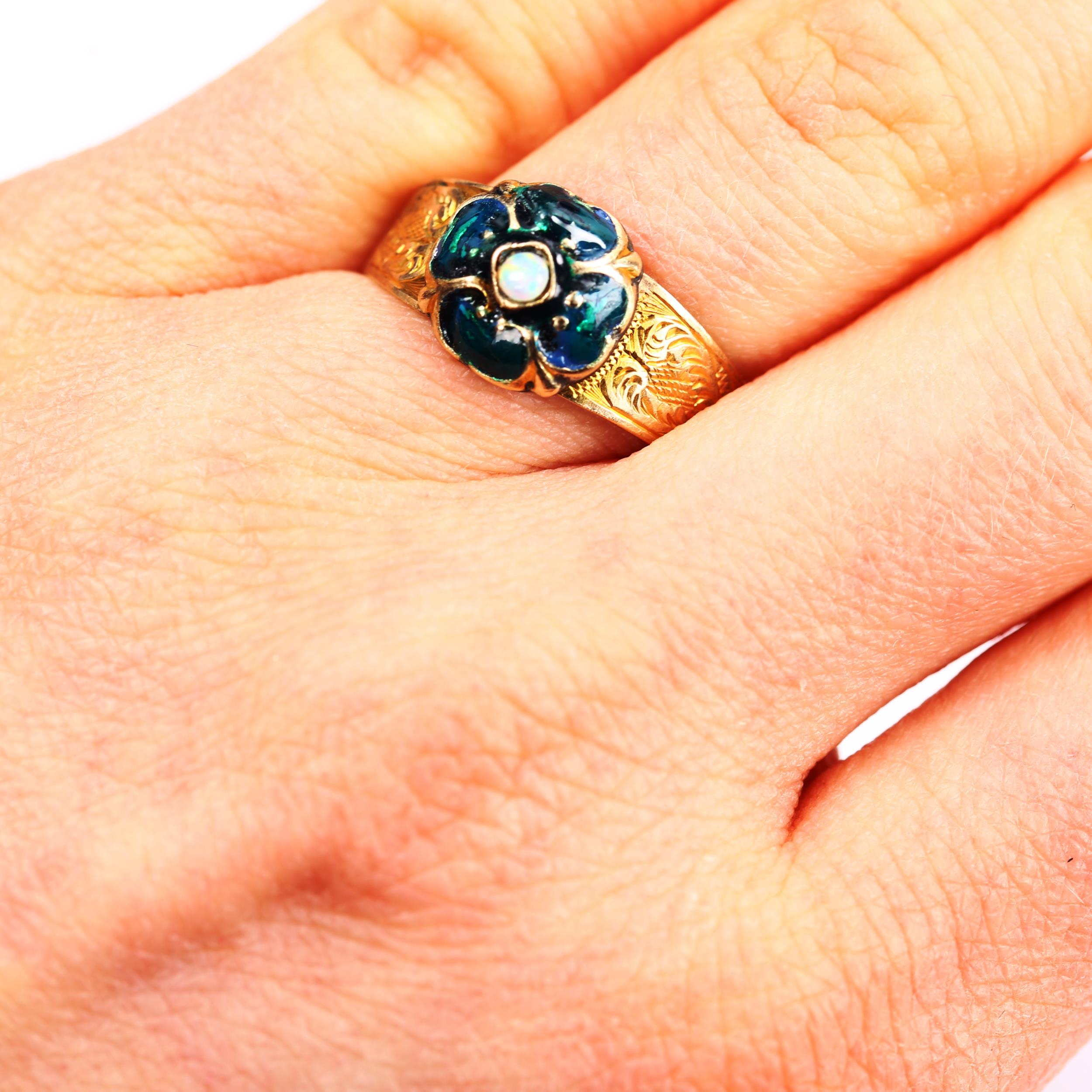 An Antique opal and enamel clover ring, unmarked gold settings with floral engraved shoulders, - Image 4 of 4