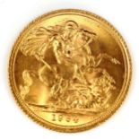An Elizabeth II 1964 gold full sovereign coin, 7.9g