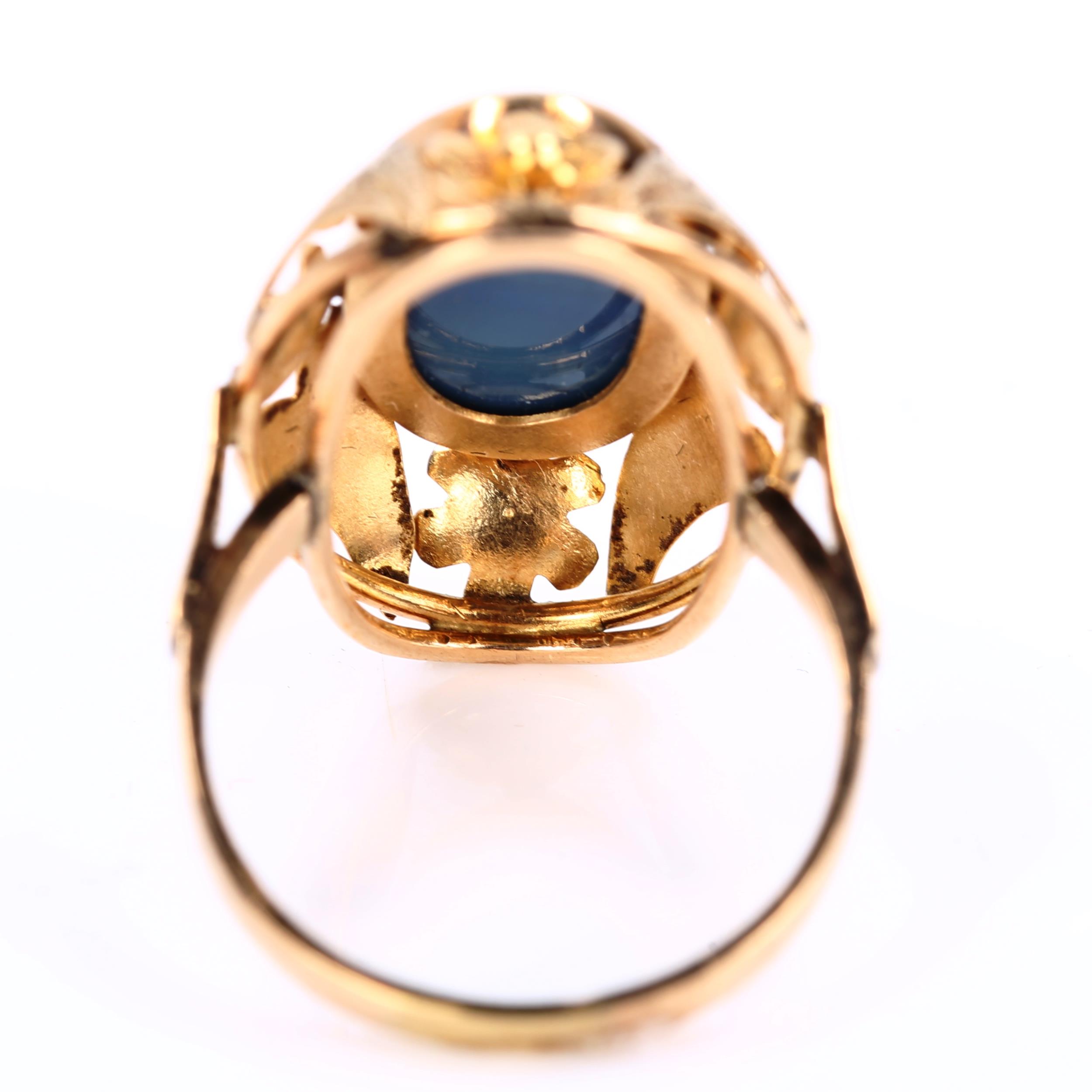 A large Continental black opal doublet dress ring, unmarked gold settings with floral bezel, setting - Image 3 of 4