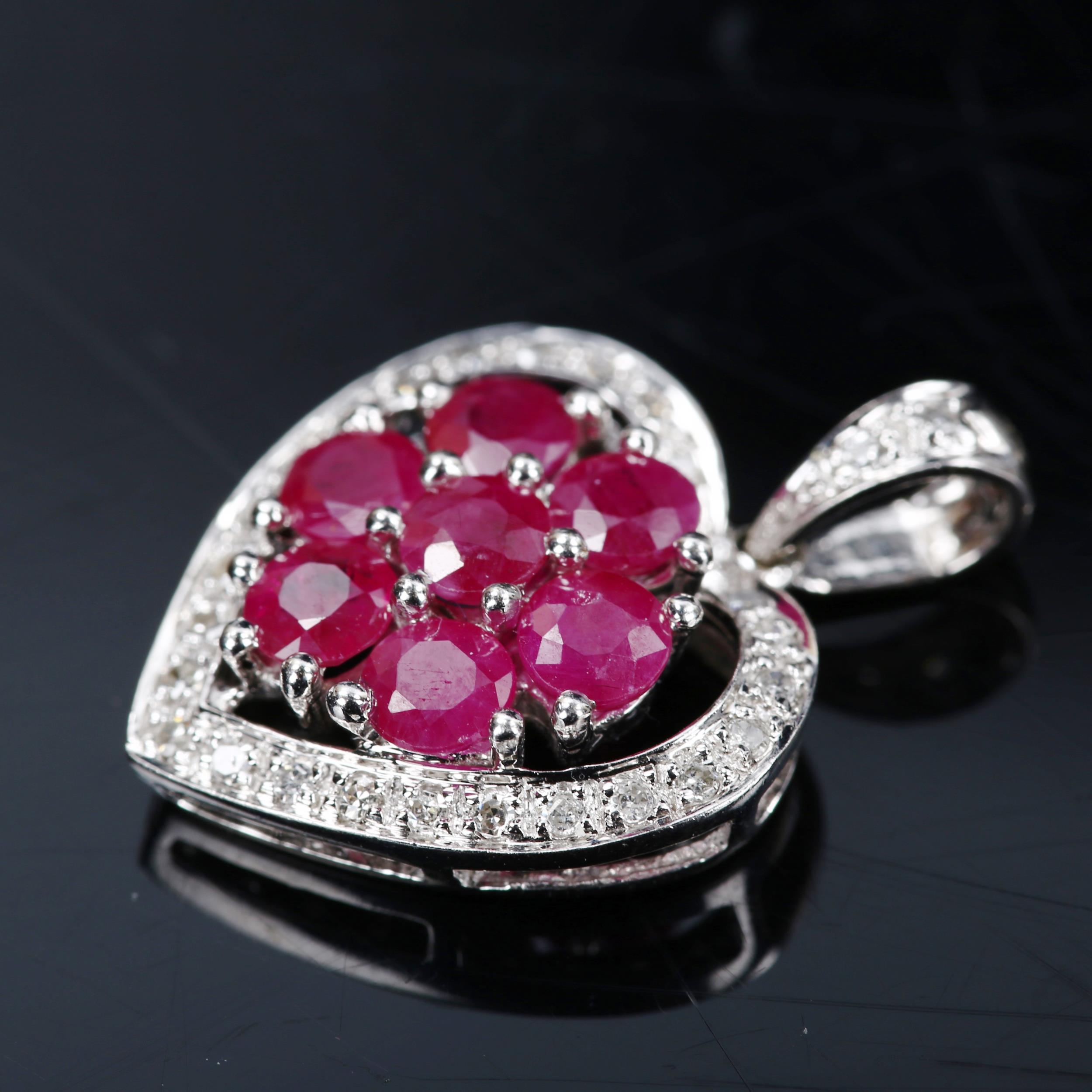 A modern 9ct white gold ruby and diamond cluster heart pendant, pendant height 23.1mm, 2.5g No - Image 2 of 4