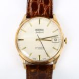ROAMER - a Vintage 9ct gold LimeLight automatic wristwatch, stiped silvered dial with gilt baton