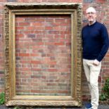 A large gilt-gesso frame, late 19th century, rebate 160cm x 110cm approx