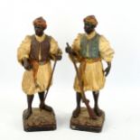A pair of Austrian cold painted spelter figures on Nubian Warriors, early 20th century, height 24cm