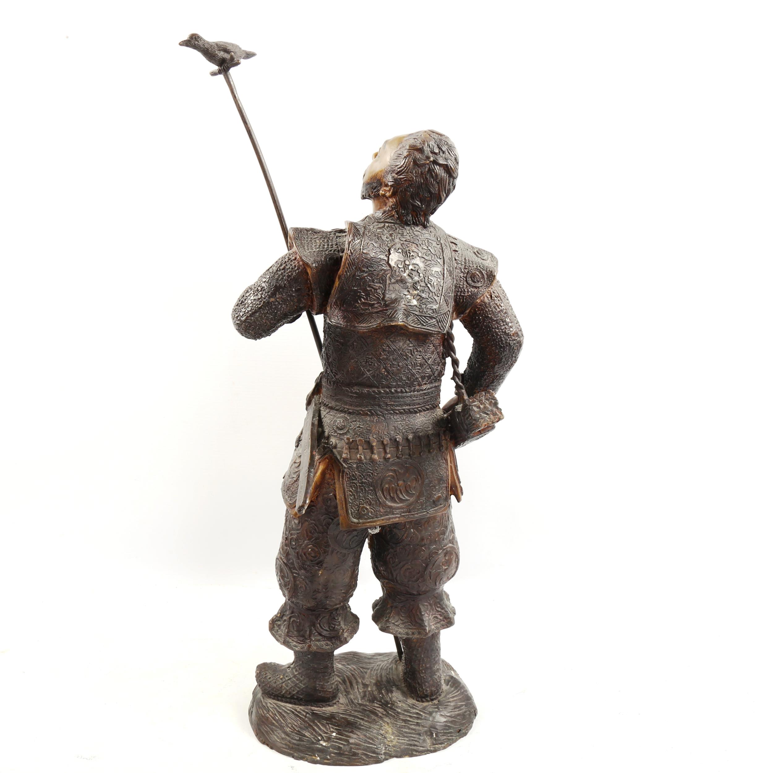 A patinated and polished bronze figure of a Japanese Samurai Warrior, height to top of head 51cm - Image 2 of 3