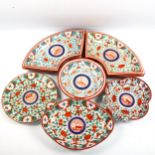 A set of 19th century hand painted porcelain serving dishes of shaped form (8)