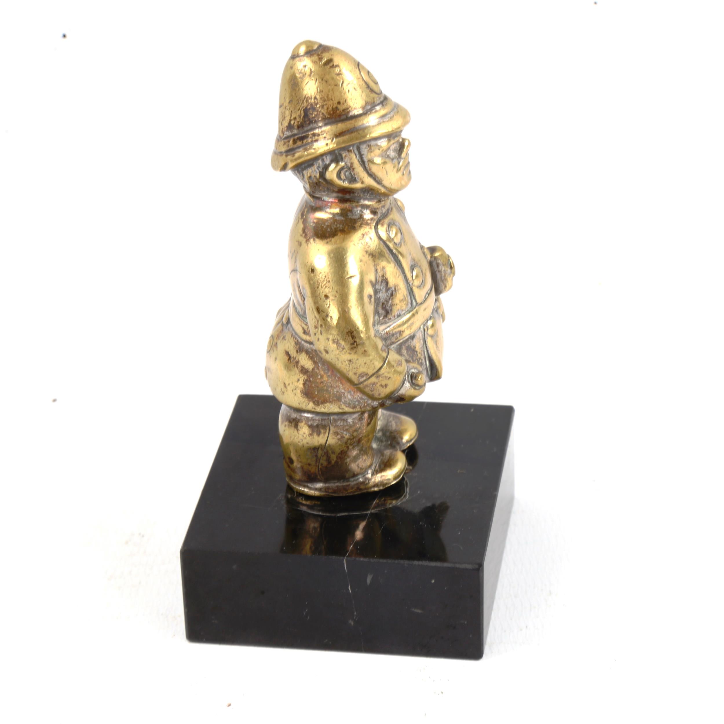 A Vintage brass policeman design car mascot, modern black glass stand, overall height 10cm - Image 3 of 3