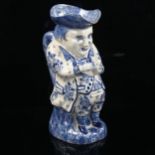 A Delft blue and white pottery Toby jug, height 26cm