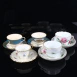 A group of cabinet cups and saucers, including pair of Meissen cups with painted roses