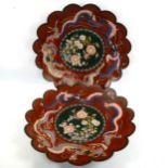 A large pair of Japanese cloisonne enamel chargers of lobed circular form, 45cm across