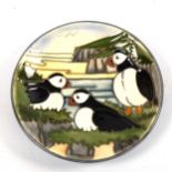 MOORCROFT POTTERY - a Puffin design dish, 1997, diameter 12cm