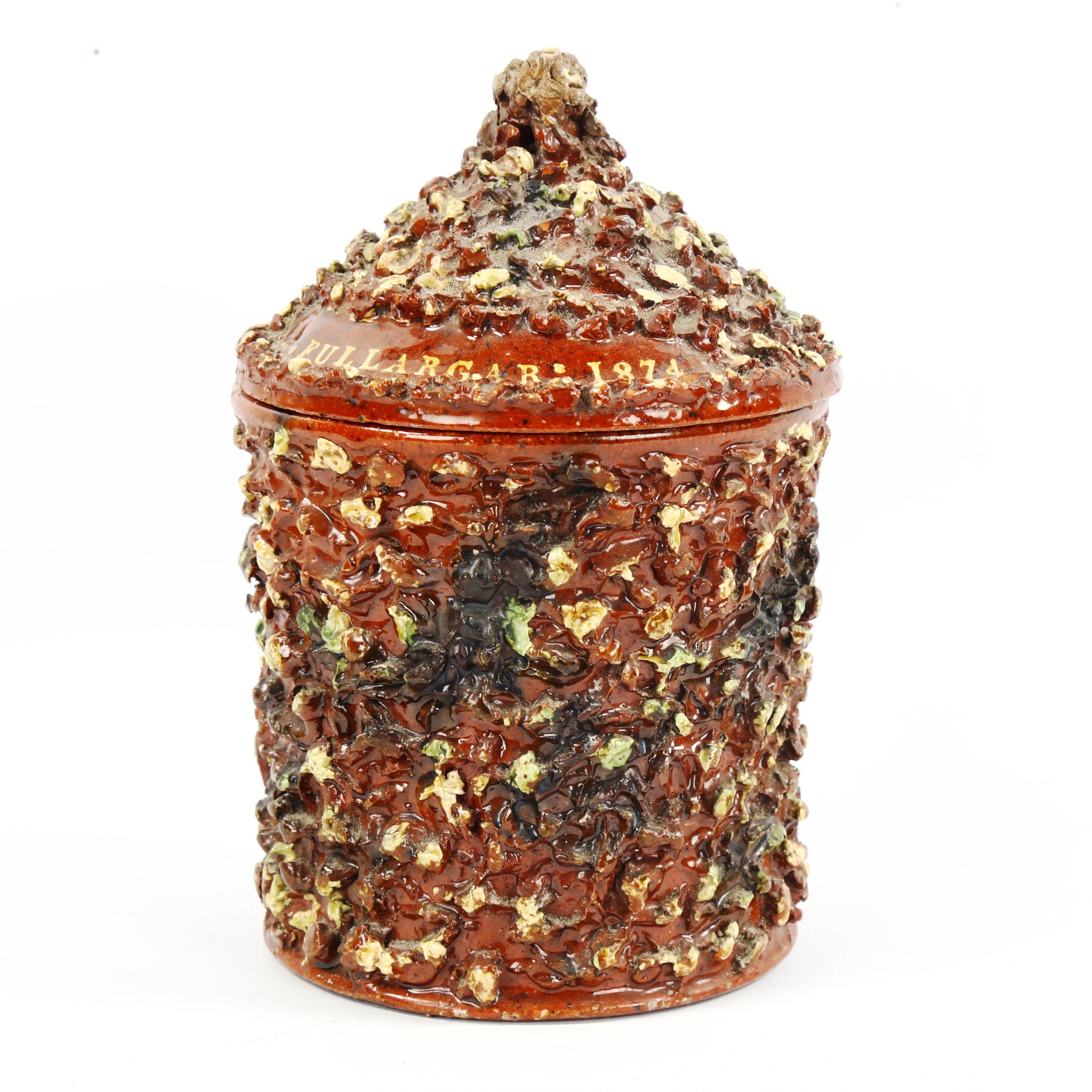 A 19th century slipware tobacco jar, probably Brede pottery, inscribed "A.Fullargar:1874", height