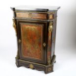 A 19th century French Boulle marquetry pier cabinet, with granite top and ormolu mouldings and