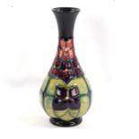 MOORCROFT POTTERY - a Violet design narrow-neck vase, height 16.5cm, boxed