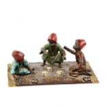 Austrian cold painted bronze sculpture, 2 Arab boys playing dice on a rug, 20cm x 14cm