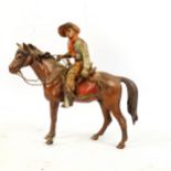 Austrian cold painted bronze cowboy on horseback, length 12cm, height 12cm