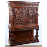 An impressive 19th century Neo-Classical design walnut 2-door cupboard, the 2 finely carved and