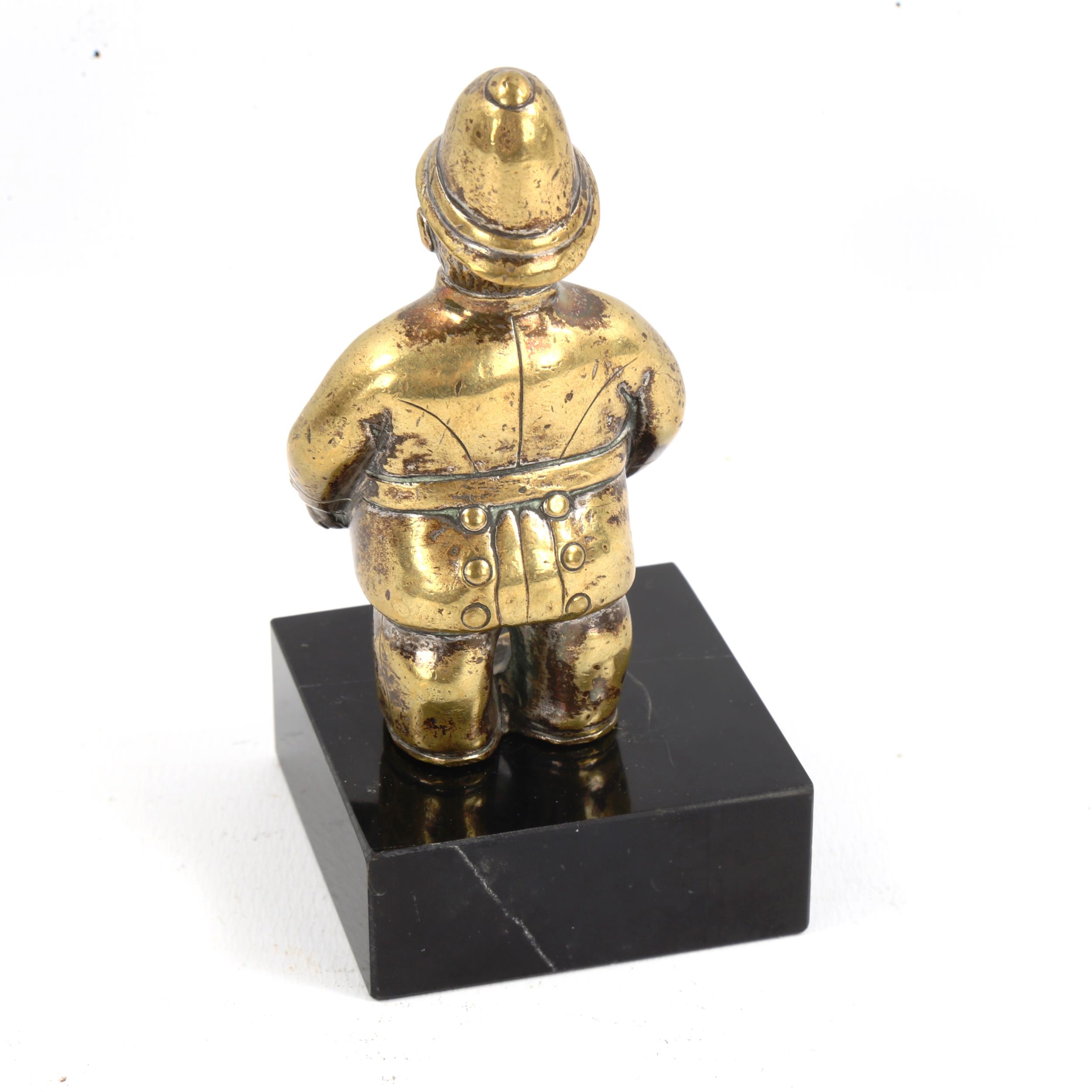 A Vintage brass policeman design car mascot, modern black glass stand, overall height 10cm - Image 2 of 3