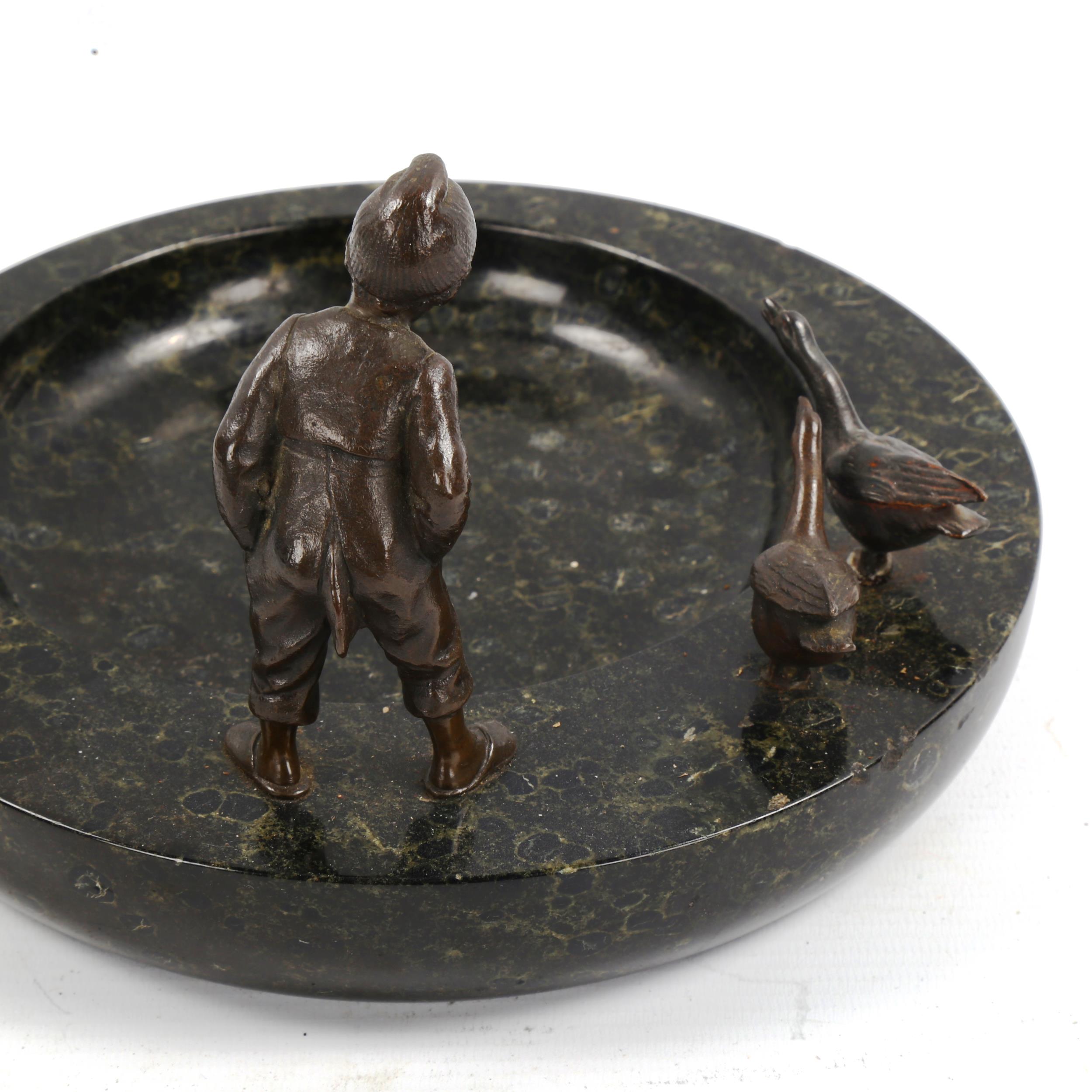 A marble bowl surmounted by bronze boy and geese, early 20th century, diameter 21cm - Image 3 of 3