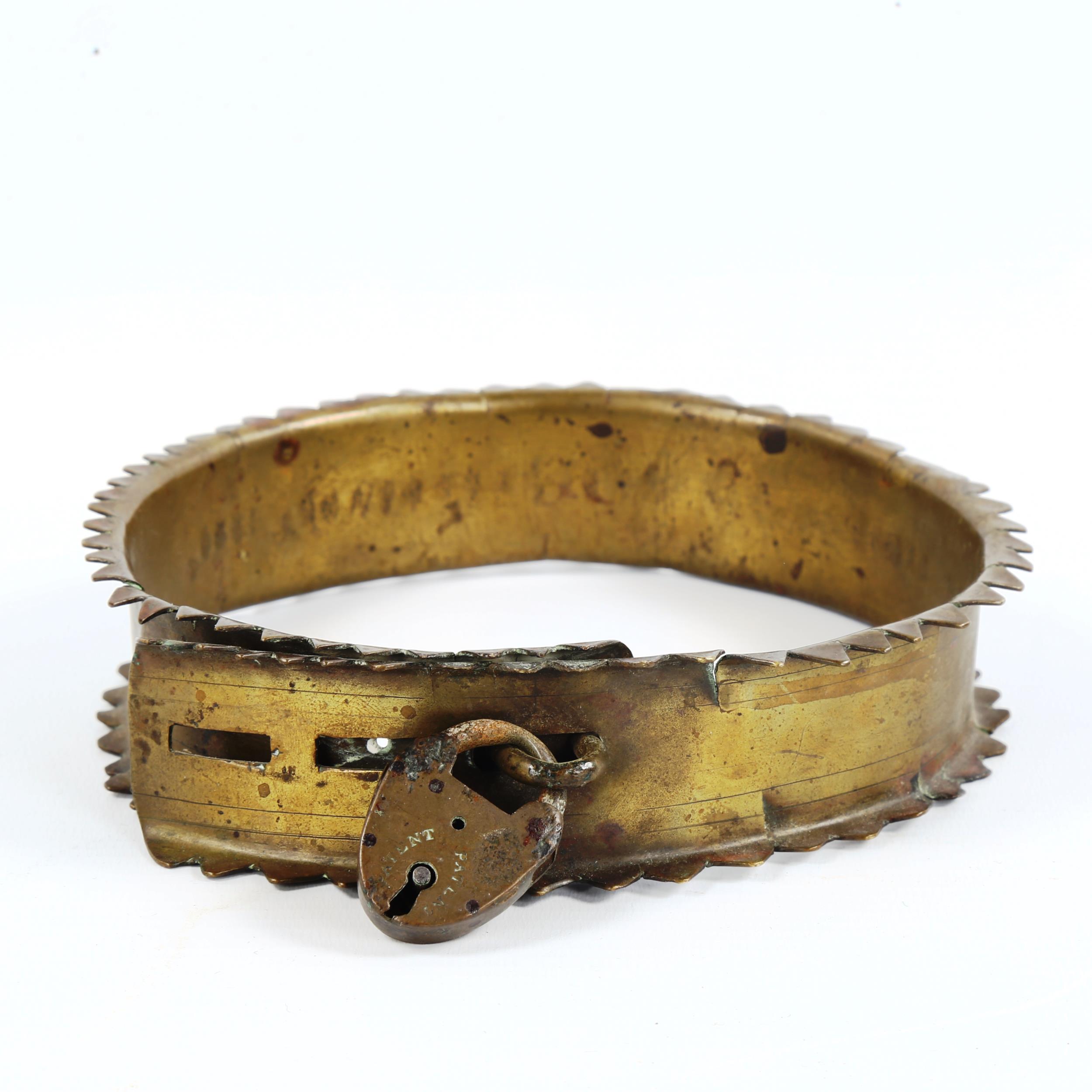 A 19th century brass dog collar with padlock clasp, inscribed Vice Admiral Mitford Hunmanby 1860, - Image 2 of 4