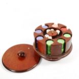 A set of gaming chips on mahogany drum-shaped stand, diameter 19cm