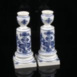 A pair of Meissen blue and white porcelain candlesticks, height 14cm