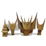 A set of 4 Sumatran bronze Minangkabau houses, largest height 29cm, length 24cm (4)