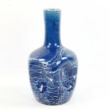 An art pottery dimple vase by Christopher Dresser for Linthorpe, makers stamp to base, height 23cm