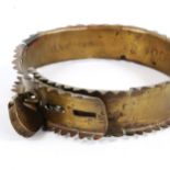 A 19th century brass dog collar with padlock clasp, inscribed Vice Admiral Mitford Hunmanby 1860,