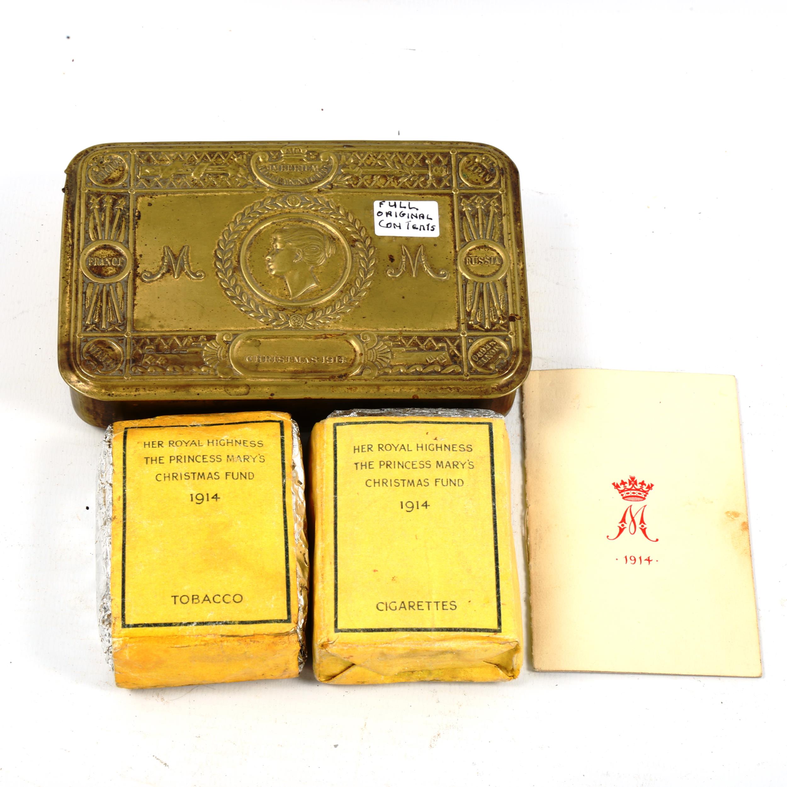 A 1914 Princess Mary Christmas tin, containing original tobacco, cigarettes and card