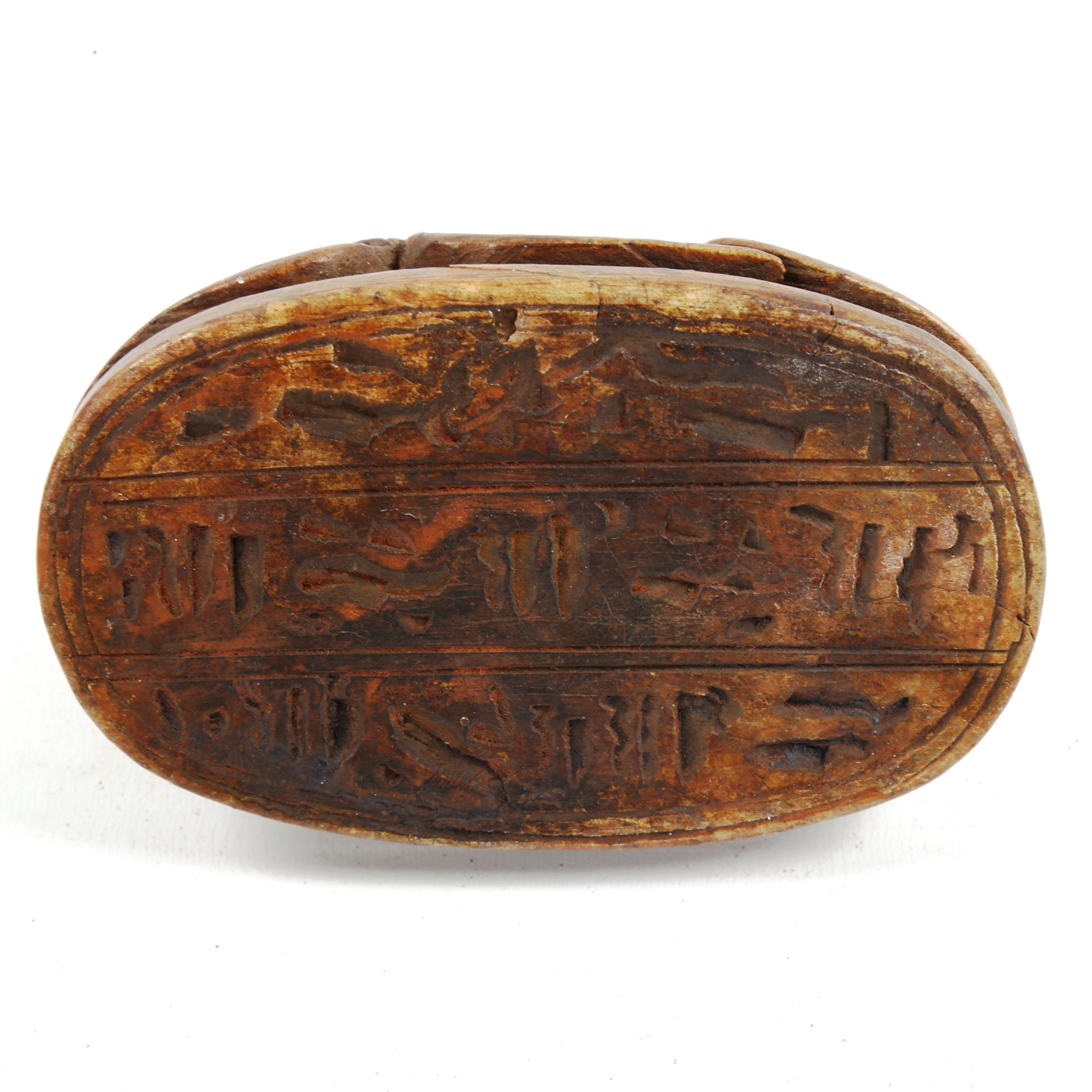 An Egyptian carved stone scarab beetle, length 9.5cm - Image 2 of 3