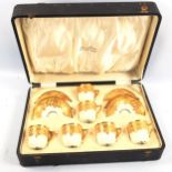 Royal Doulton peach ground coffee service with gilded decoration, original box