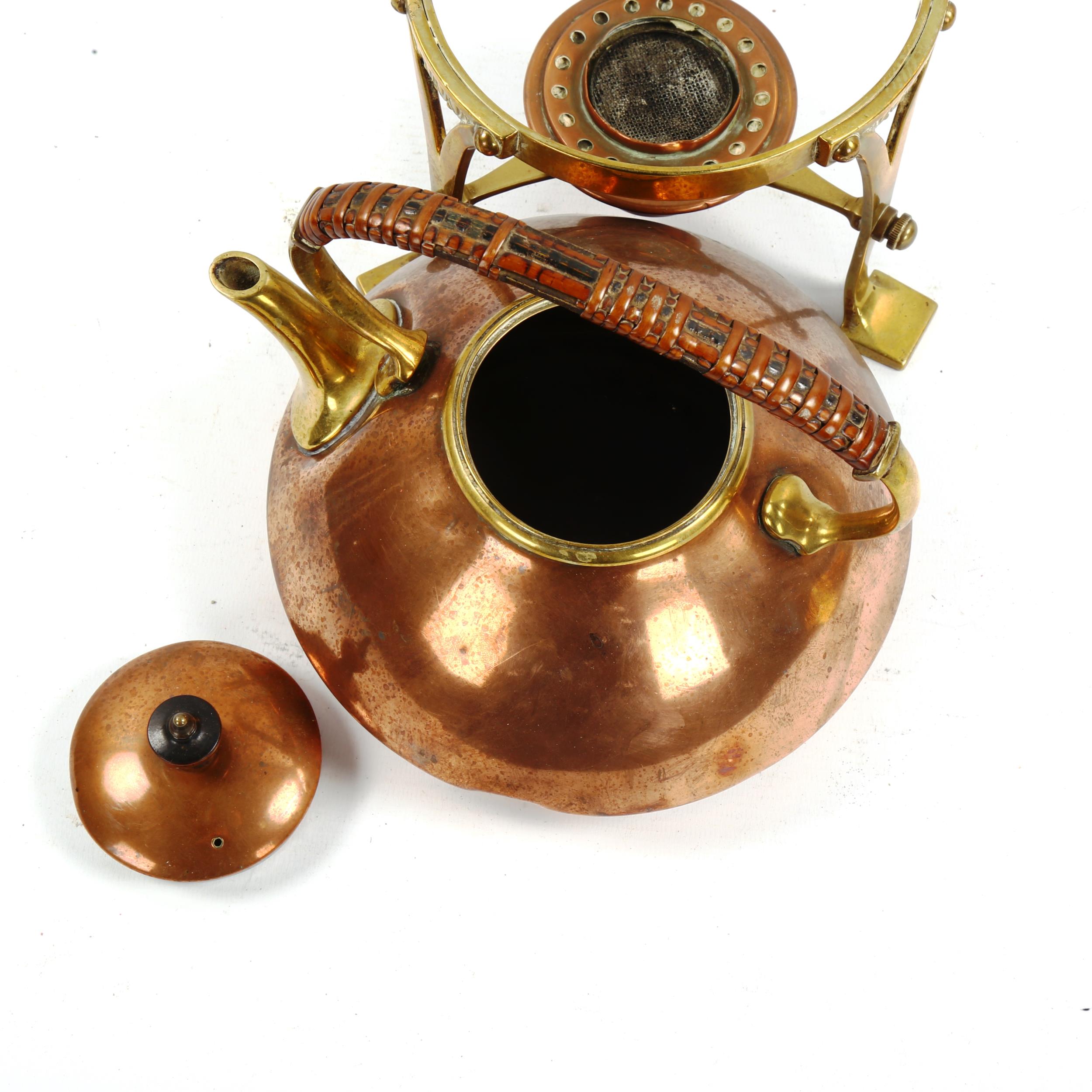 An Arts and Crafts copper and brass tea kettle on stand, with wicker handle - Image 3 of 3