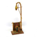 Austrian cold painted spelter lamp in the form of an Arab carpet seller, early to mid-20th