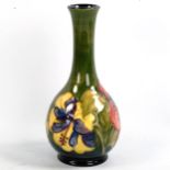 MOORCROFT POTTERY - a narrow-necked vase, painted signature, height 22cm