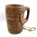 A Polynesian wood bucket, with integral carved lizard design handle and rope suspension, height