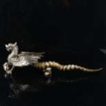 An antique Walker and Hall table-top lighter, silver plate dragon form with antelope horn body,