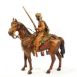 Austrian cold painted bronze Arab rifleman on horseback, length 12cm, height 15cm