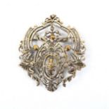 A Victorian unmarked gilded white metal badge, cast and pierced decoration, height 8cm