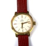 OMEGA - a lady's gold plated Deville mechanical wristwatch, silvered crosshair dial with gilt