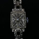 BUCHERER - a lady's Continental silver and marcasite mechanical bracelet watch, silvered dial with