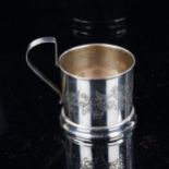 From AGATHA CHRISTIE ESTATE - a Russian silver tea glass holder, engraved floral decoration, 84