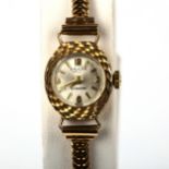 ENICAR - a lady's 9ct gold Ultrasonic mechanical bracelet watch, silvered dial with gilt quarterly