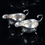 2 silver cream jugs, with scalloped rims and C-shaped handles, largest length 15cm, 7.4oz total (