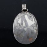 GEORG JENSEN - a Danish iron and silver fish pendant, designed by Arno Malinowski, model no. 5025,