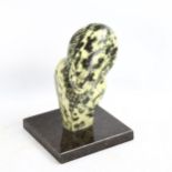 Emmanuel Changunda, Zimbabwe Shona mottled stone abstract figure sculpture, on black marble base,