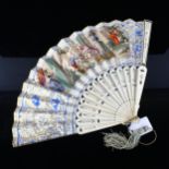 A 19th century French bone and paper fan, with hand-coloured printed romantic scenes, length 27cm